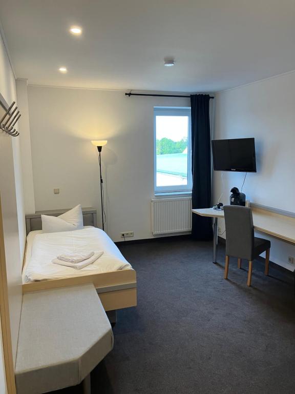 TV a/nebo společenská místnost v ubytování Room-24 - Zellwald