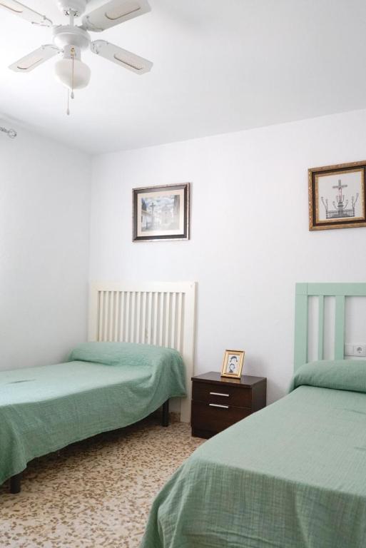 Postel nebo postele na pokoji v ubytování VILLA PEPUCHO 3