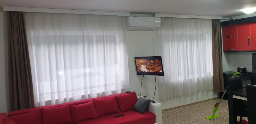 TV a/nebo společenská místnost v ubytování Apartmani Grza