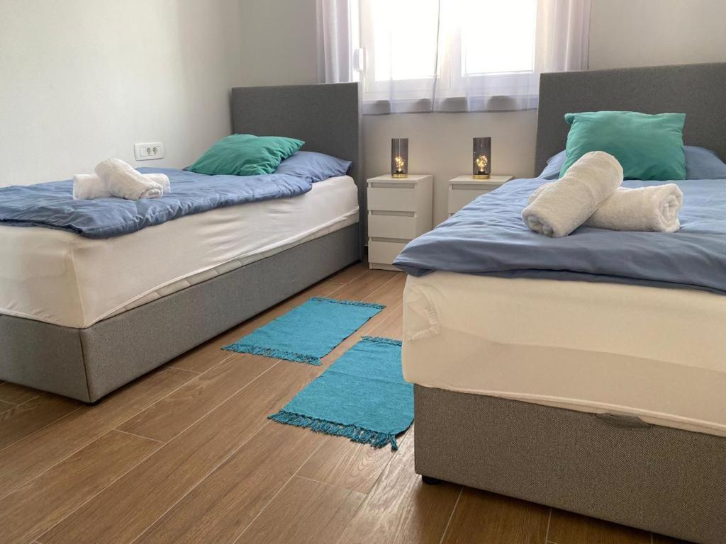 Posteľ alebo postele v izbe v ubytovaní Adria-Appartment-Island-Vir #sea #beach #wifi #privateparking #netflix