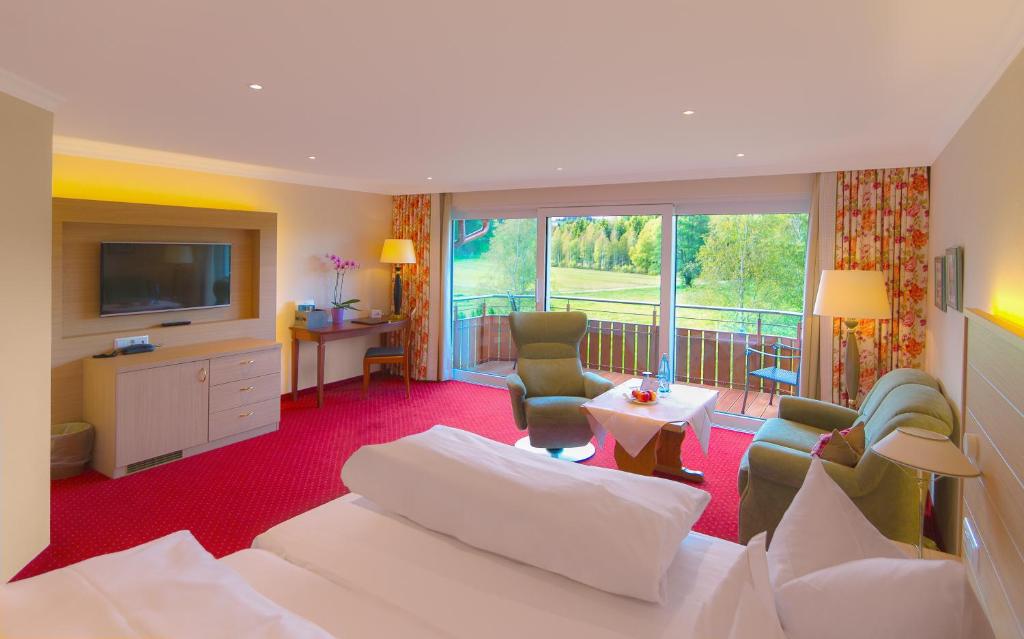 TV a/nebo společenská místnost v ubytování Hotel Thomahof