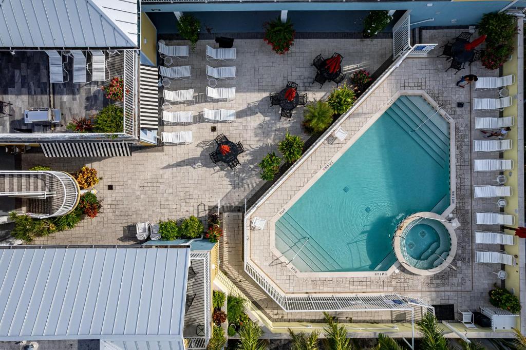 an overhead view of a swimming pool in a building at Harbour House at the Inn 207 in Fort Myers Beach