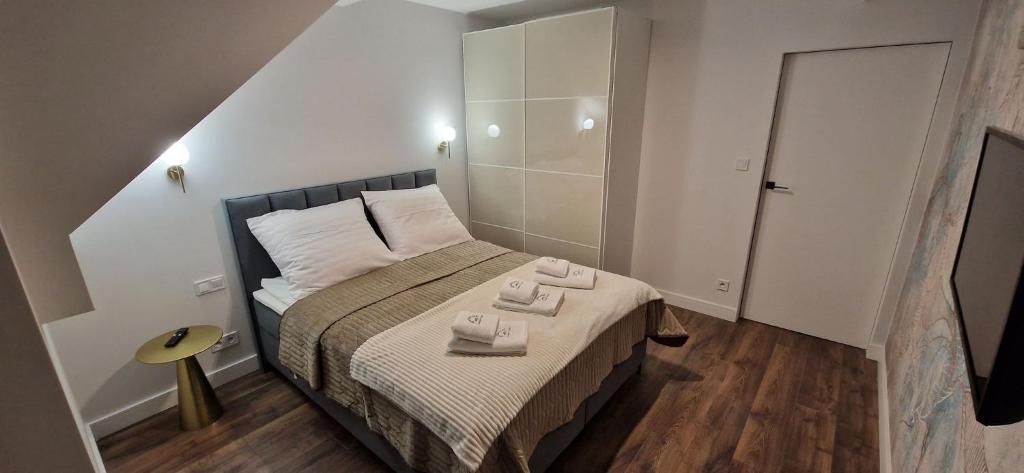 Posteľ alebo postele v izbe v ubytovaní Apartament Szklarski Widok