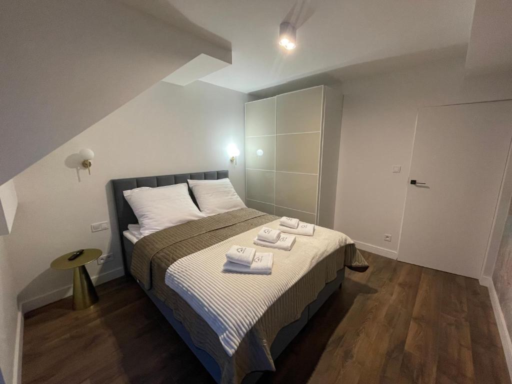 Posteľ alebo postele v izbe v ubytovaní Apartament Szklarski Widok