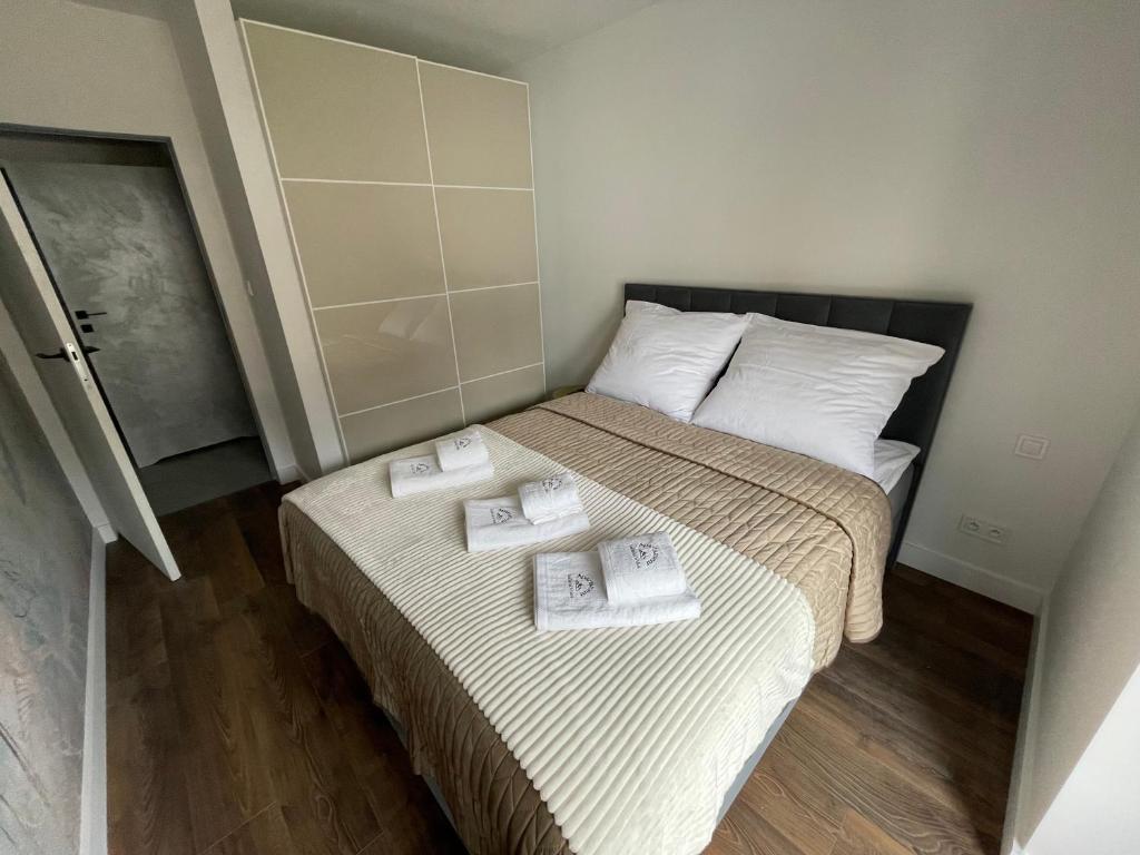 Posteľ alebo postele v izbe v ubytovaní Apartament Szklarski Widok