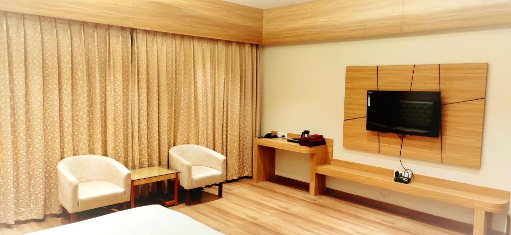 TV a/nebo společenská místnost v ubytování Hotel 9 Coin