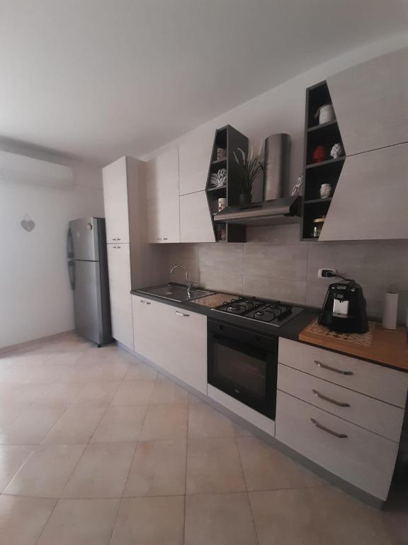 Kuchyň nebo kuchyňský kout v ubytování Sun House Sicily