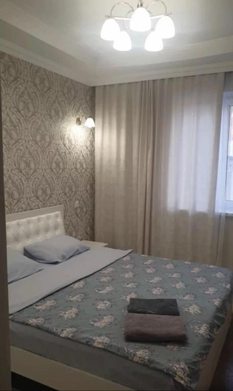Postel nebo postele na pokoji v ubytování Роща 7