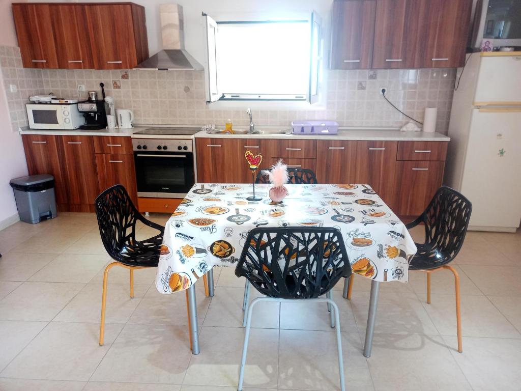 Kuchyň nebo kuchyňský kout v ubytování SARDINIA LUX HOUSE 697 4349 5 12