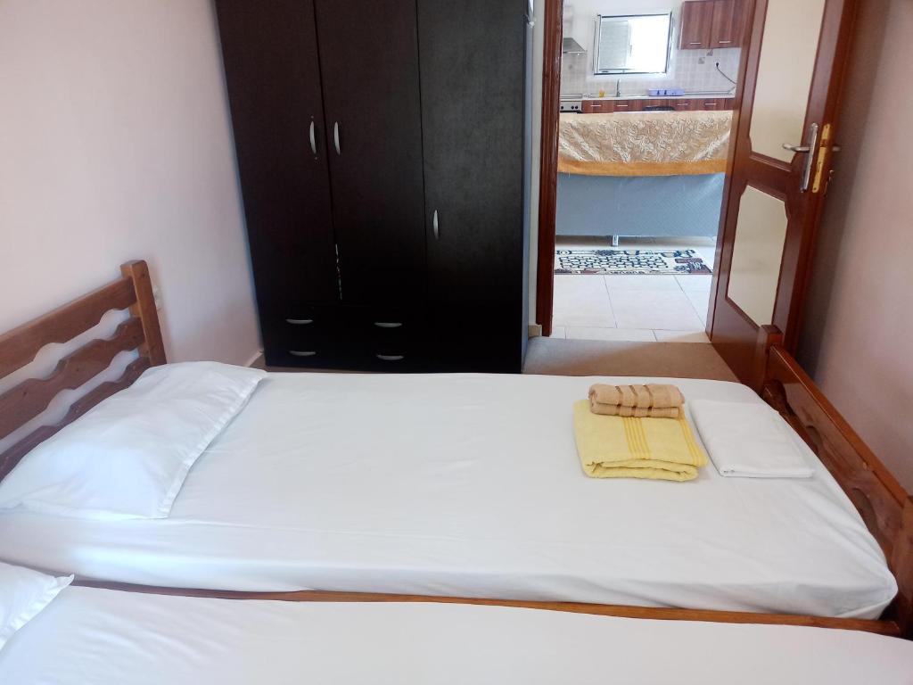 Postel nebo postele na pokoji v ubytování SARDINIA LUX HOUSE 697 4349 5 12