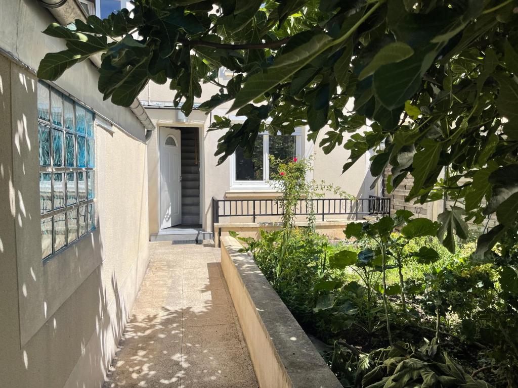 Zahrada ubytování Maison Hotel proche Paris et Orly