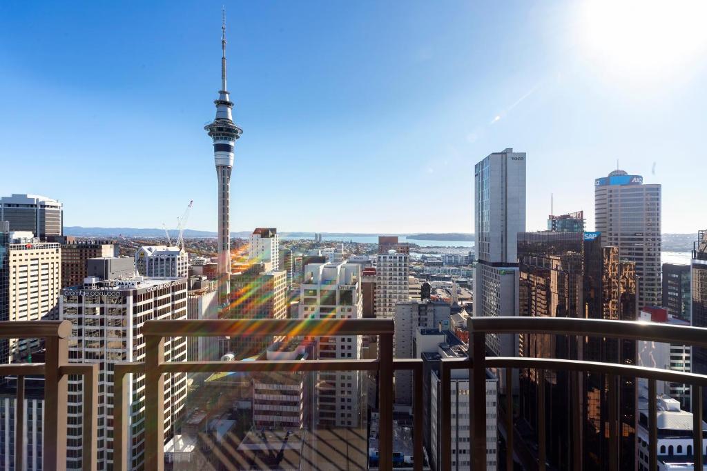 a view of a city with the eiffel tower at Luxury Penthouse Apartment in Auckland