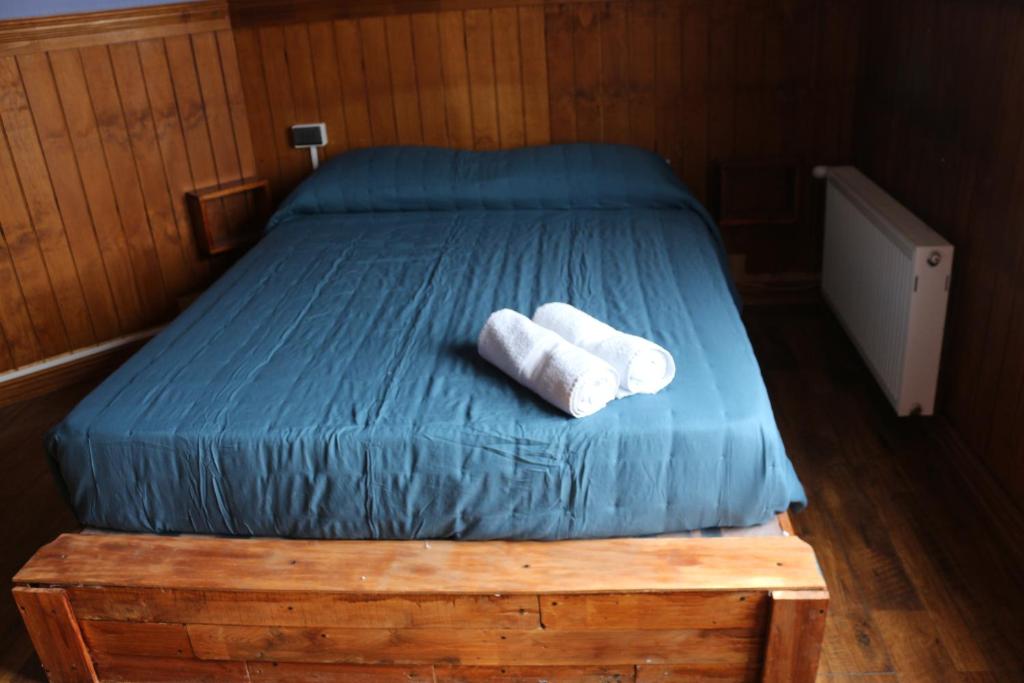 Postel nebo postele na pokoji v ubytování Hostal Ochen