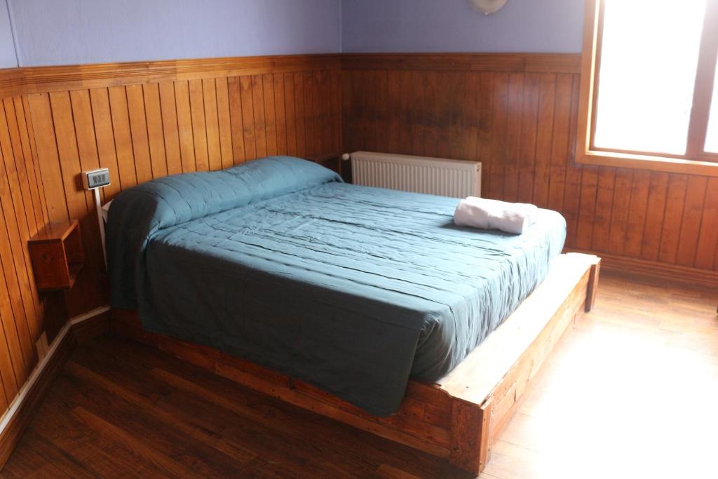 Postel nebo postele na pokoji v ubytování Hostal Ochen