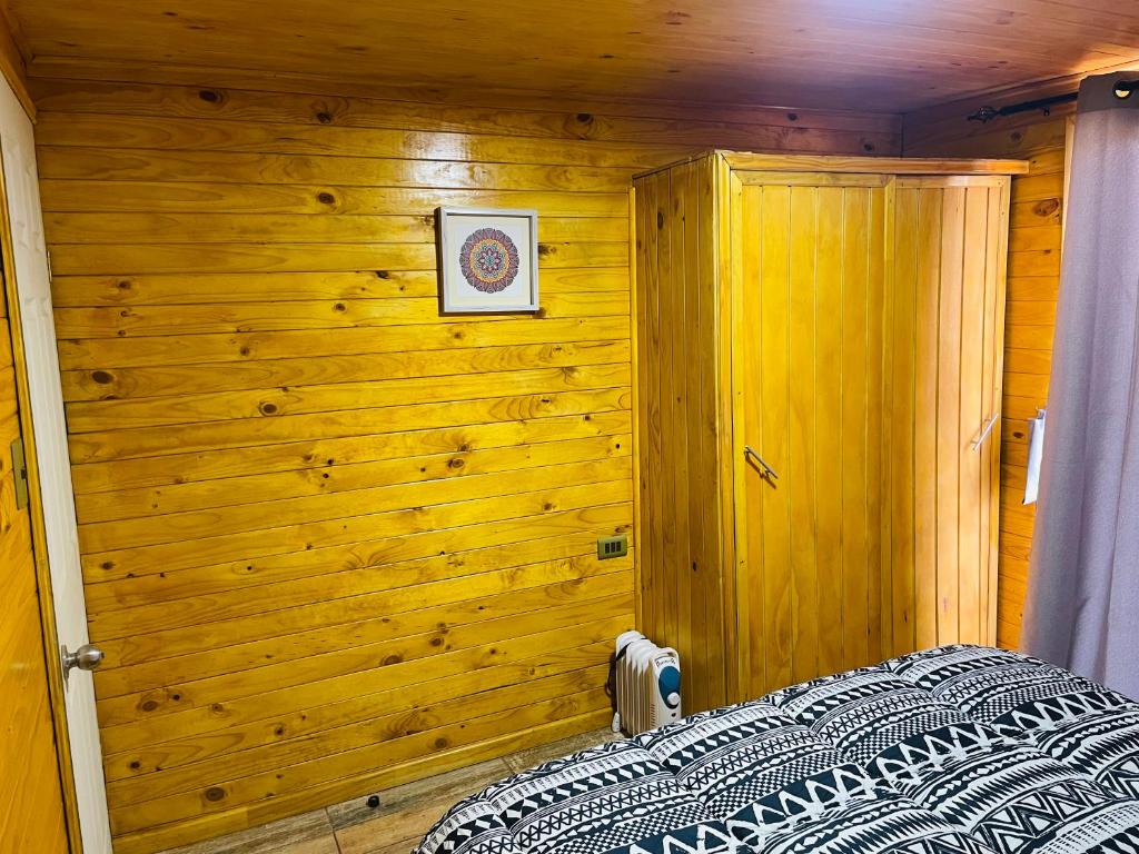 Postel nebo postele na pokoji v ubytování ELUNEY Combarbala