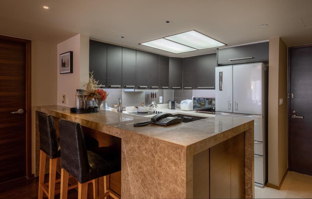 Köök või kööginurk majutusasutuses Shanghai Centre Serviced Apartment