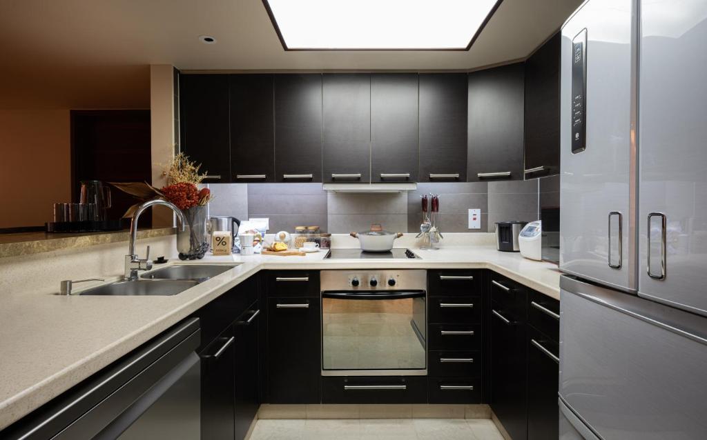 Köök või kööginurk majutusasutuses Shanghai Centre Serviced Apartment