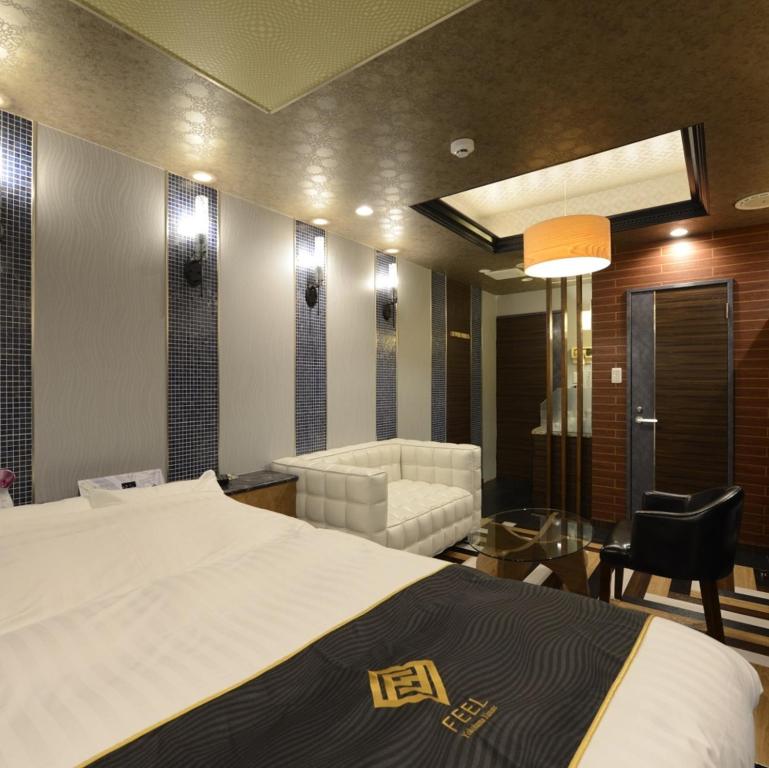 Postel nebo postele na pokoji v ubytování Hotels & Resort Feel