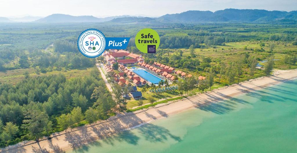 an aerial view of a resort next to the beach at Le Menara Khao Lak in Khao Lak