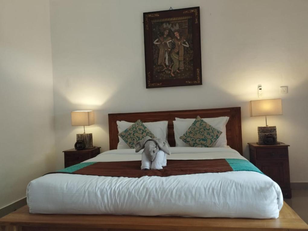 Postel nebo postele na pokoji v ubytování Bupala Guest House