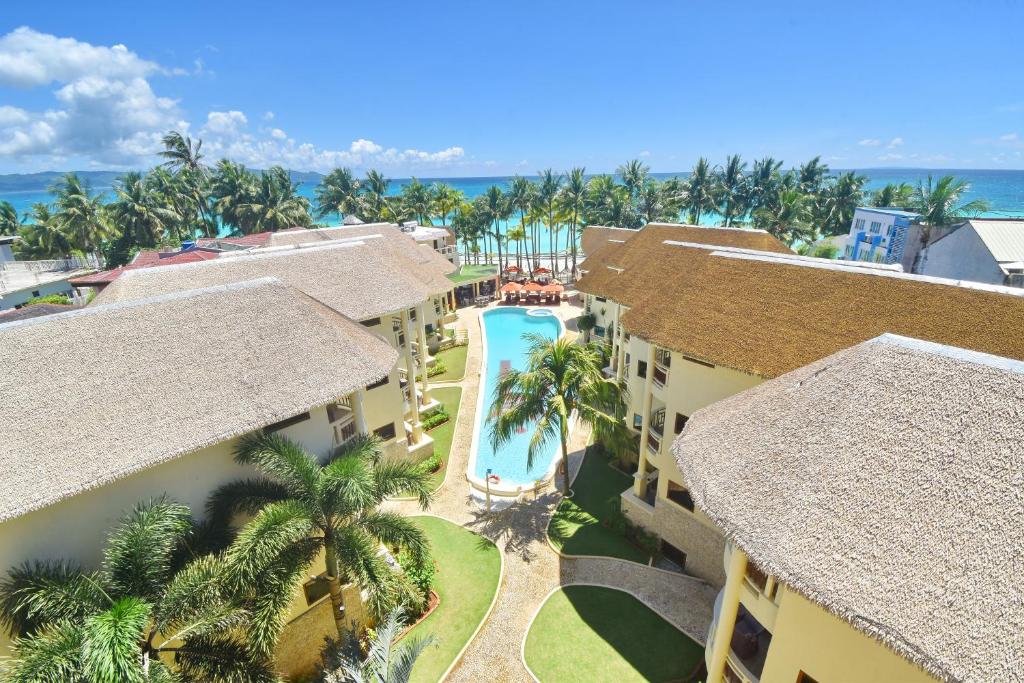 an aerial view of a resort with a swimming pool at Ambassador In Paradise in Boracay