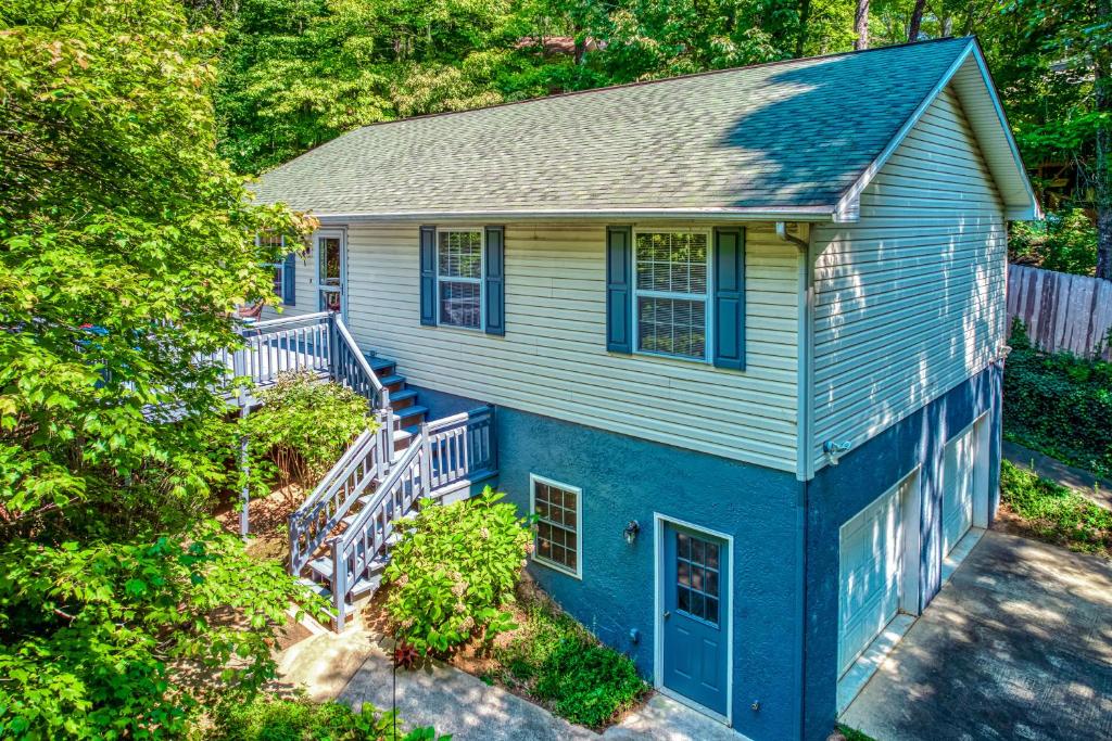 an overhead view of a blue house with a porch at Pelican's Perch in Waynesville