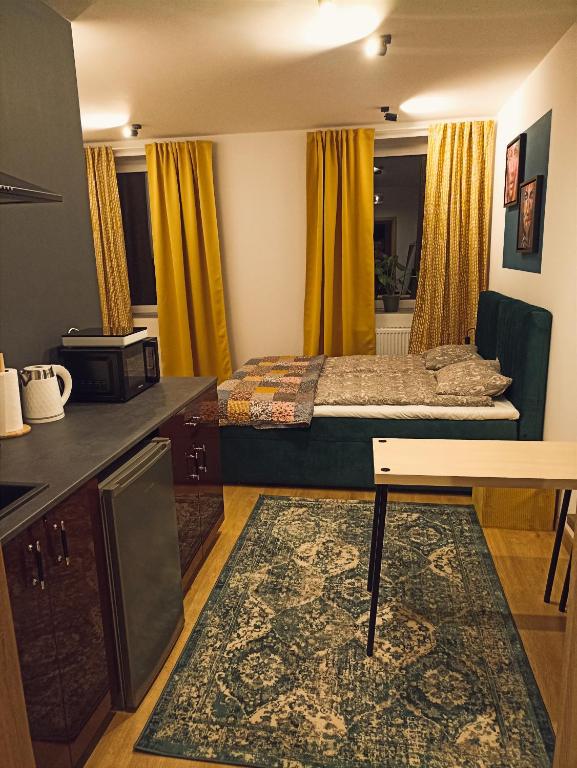 Posteľ alebo postele v izbe v ubytovaní Apartamenty Zakładowa
