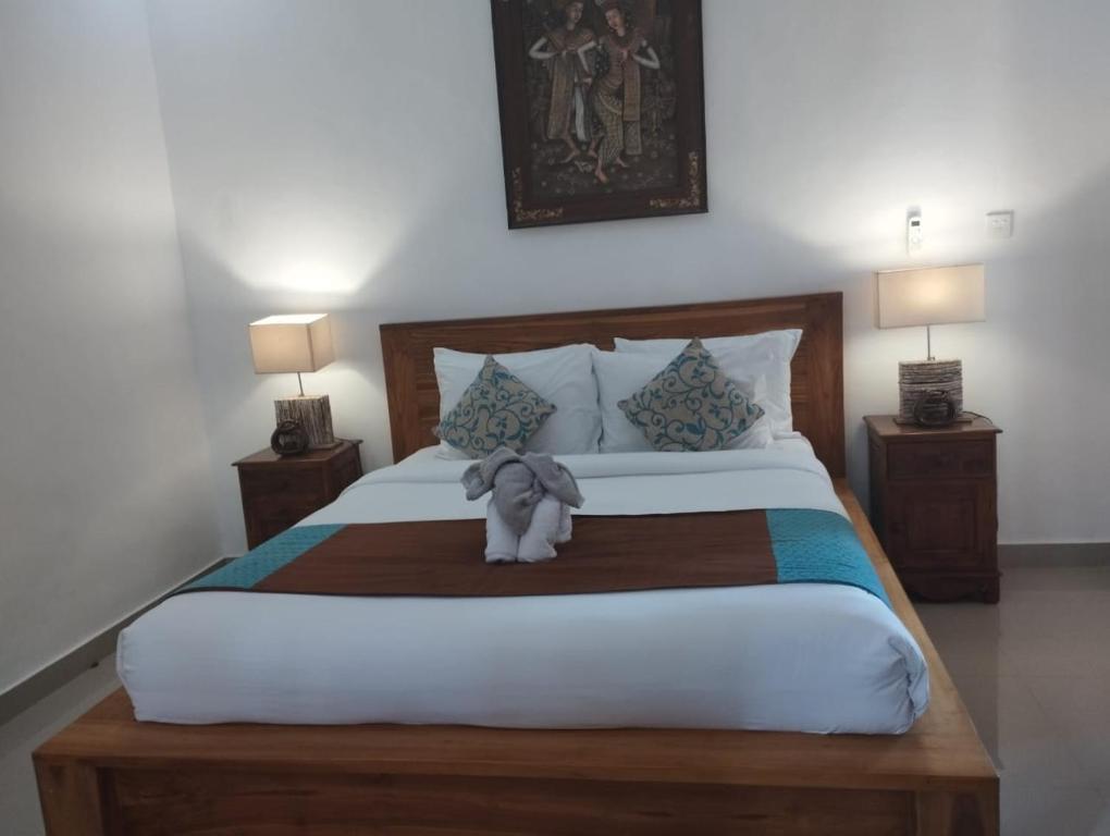 Postel nebo postele na pokoji v ubytování Bupala Guest House