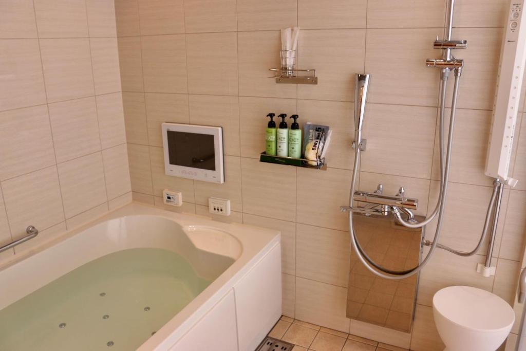 Koupelna v ubytování BREATH HOTEL