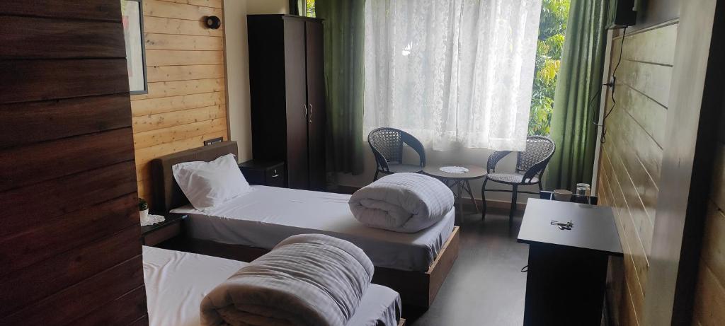 Tito's Homestay - Tweelingzaal
