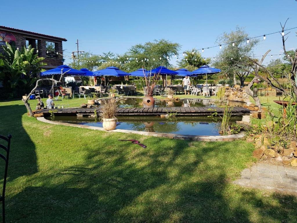 Zahrada ubytování Nyani Lodge Dinokeng