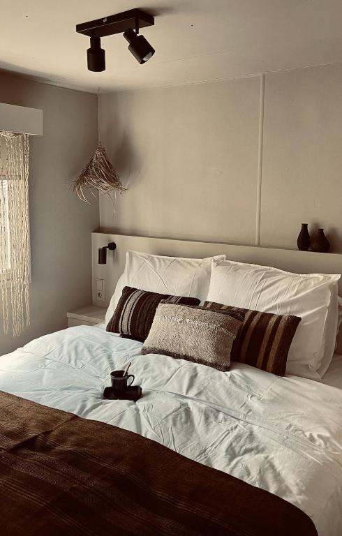 Postel nebo postele na pokoji v ubytování Zomerzoen Casa