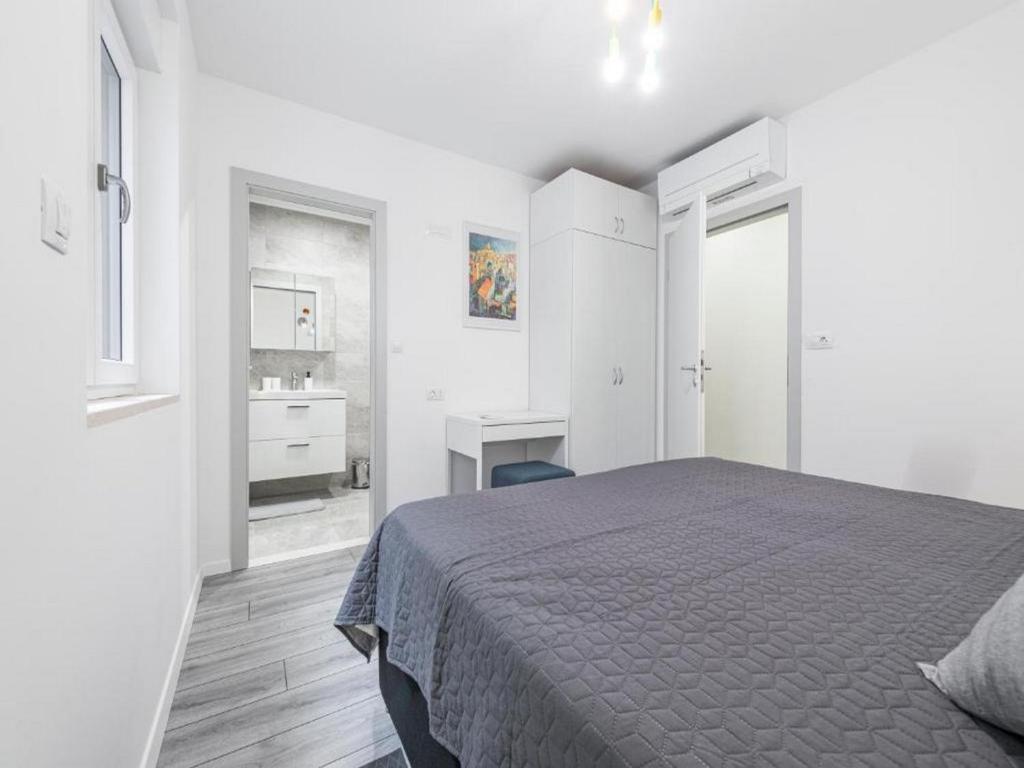 Posteľ alebo postele v izbe v ubytovaní Family Holiday Home Nest