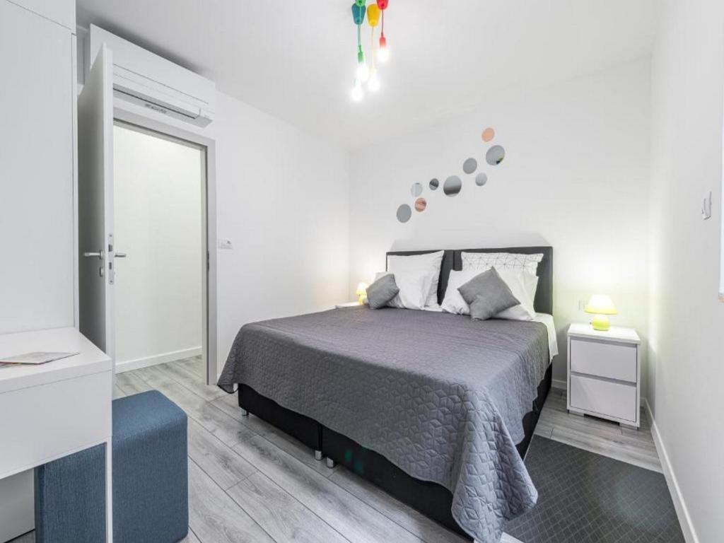 Posteľ alebo postele v izbe v ubytovaní Family Holiday Home Nest