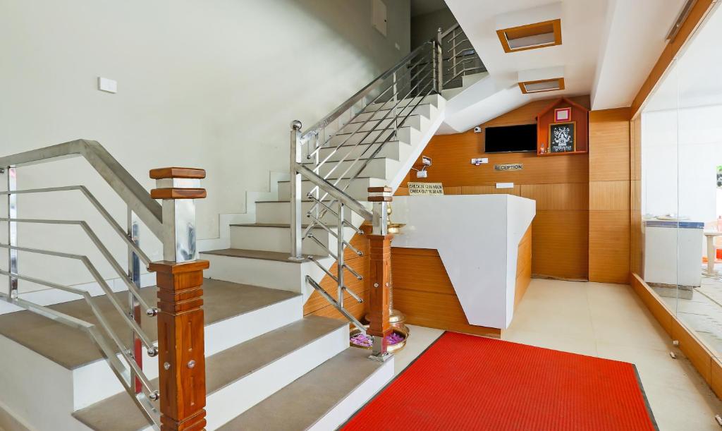 TV a/nebo společenská místnost v ubytování Itsy Hotels Kottaram Residency