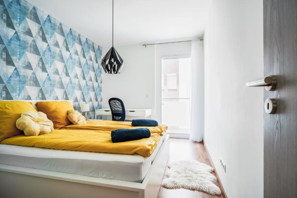 A bed or beds in a room at Vig Apartment - with Private Parking