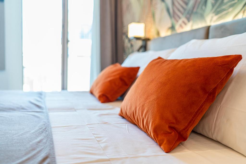 Postel nebo postele na pokoji v ubytování Hotel Excelsior