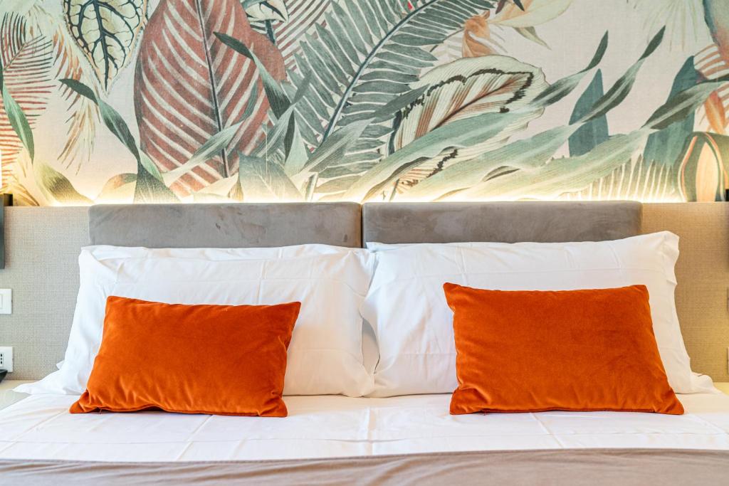 Postel nebo postele na pokoji v ubytování Hotel Excelsior