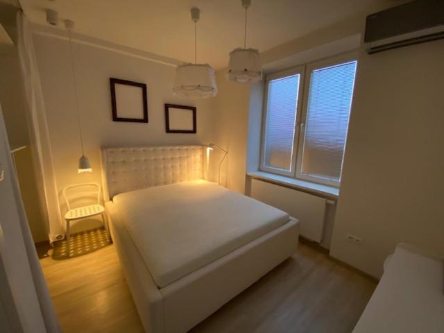 Postel nebo postele na pokoji v ubytování Moderný byt v centre mesta