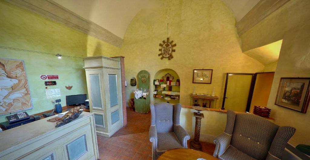 Kuchyň nebo kuchyňský kout v ubytování Monastero Le Grazie