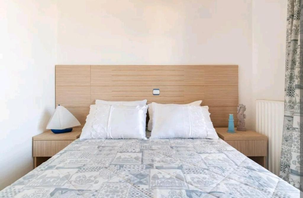 Postel nebo postele na pokoji v ubytování Iris Home