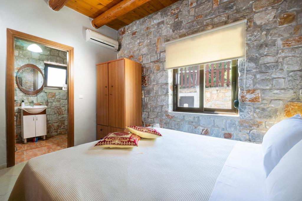 Posteľ alebo postele v izbe v ubytovaní Cretan Residence Villa