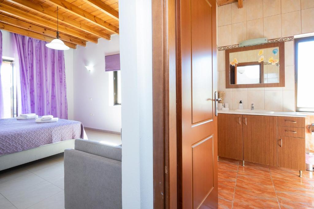 Posteľ alebo postele v izbe v ubytovaní Cretan Residence Villa