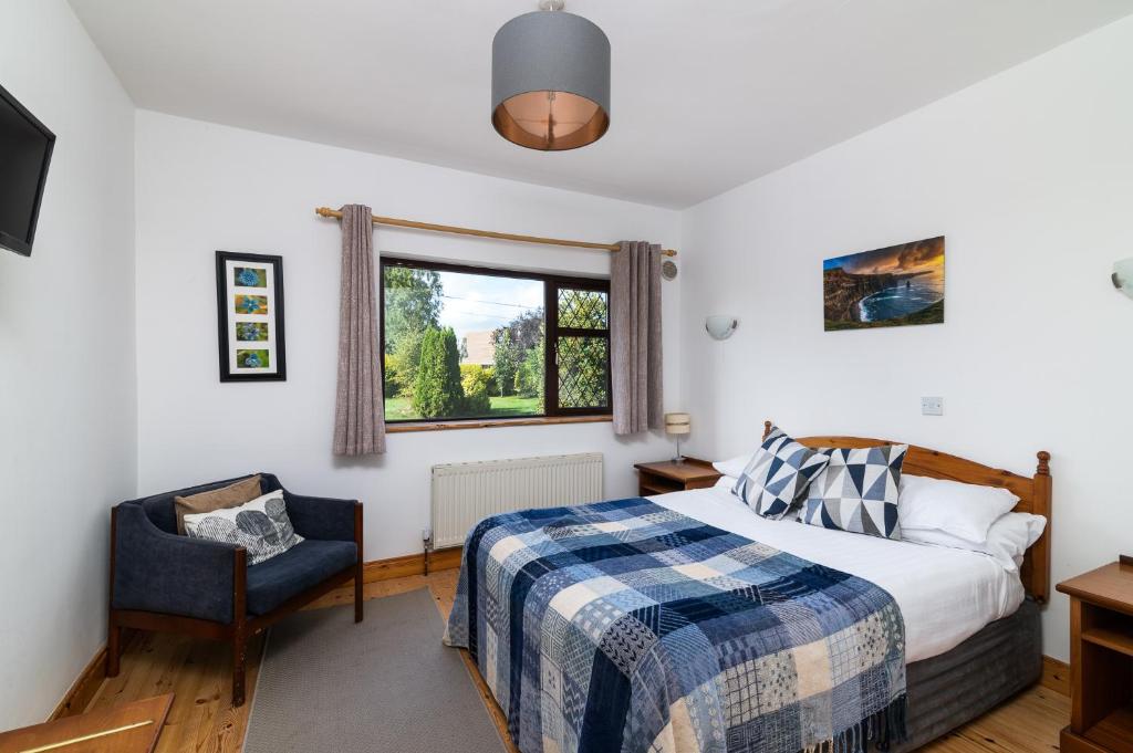 Postel nebo postele na pokoji v ubytování Ely House B&B