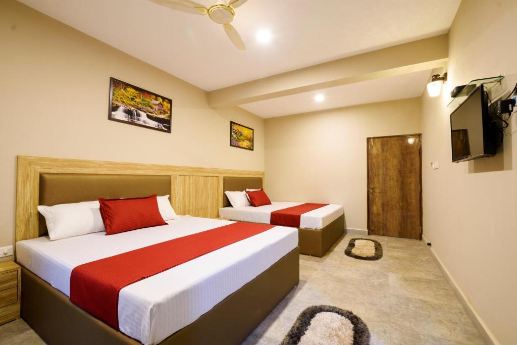 Postel nebo postele na pokoji v ubytování Casa Da Village Calangute Goa