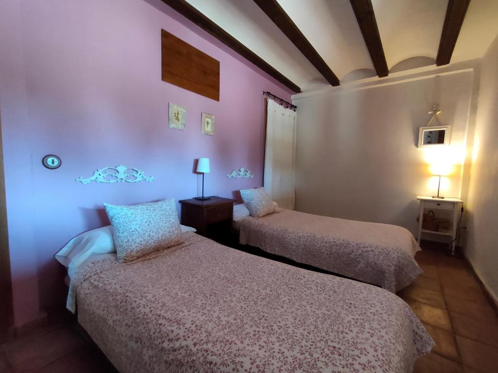 Postel nebo postele na pokoji v ubytování Masia los Toranes - Destino Starlight