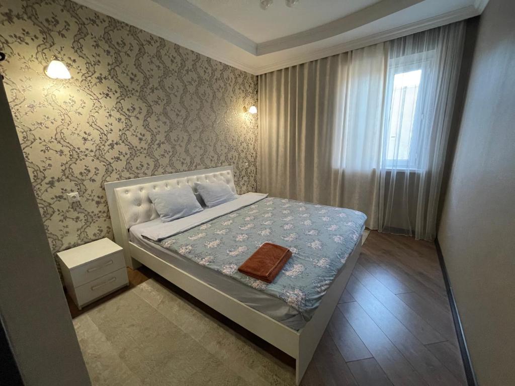Postel nebo postele na pokoji v ubytování Роща 7