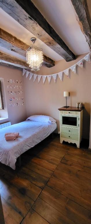 Postel nebo postele na pokoji v ubytování Casa Robelca
