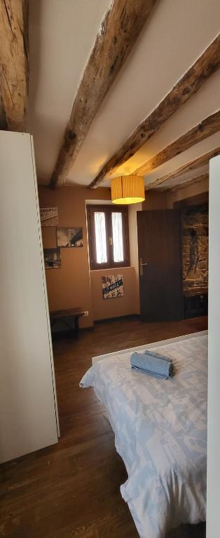 Postel nebo postele na pokoji v ubytování Casa Robelca