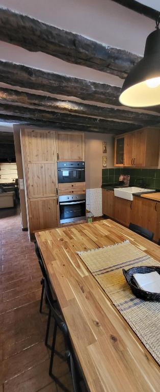 Kuchyň nebo kuchyňský kout v ubytování Casa Robelca
